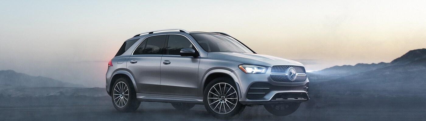 Mercedes-Benz GLE Grey Mercedes-Benz GLE 350 parked on a misty desert plain