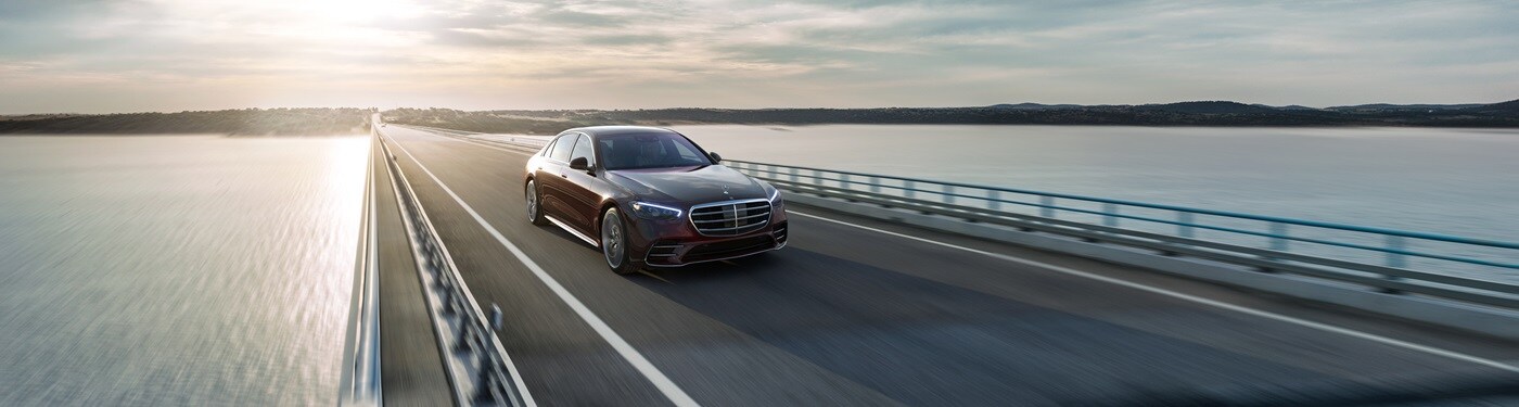 Mercedes-Benz S-Class Mercedes-Benz S-Class driving across a bridge