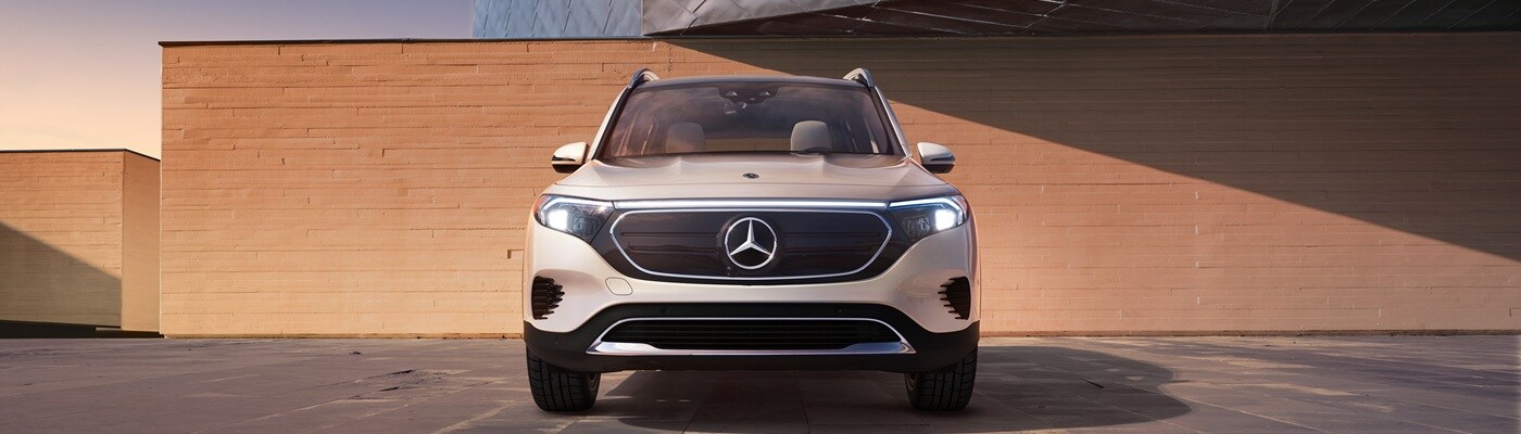 Mercedes-Benz EQB White EQB parked near a modern building