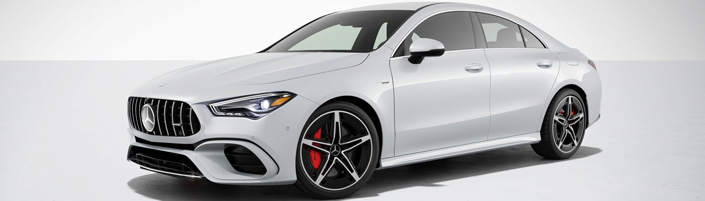 Mercedes-Benz AMG CLA 45 White Mercedes-Benz AMG CLA 45 parked in a white void space