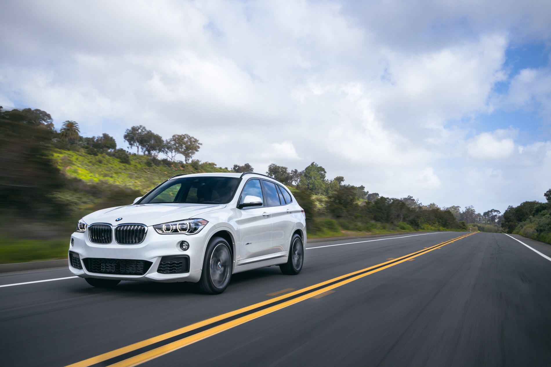 BMW X1 White Road Driving