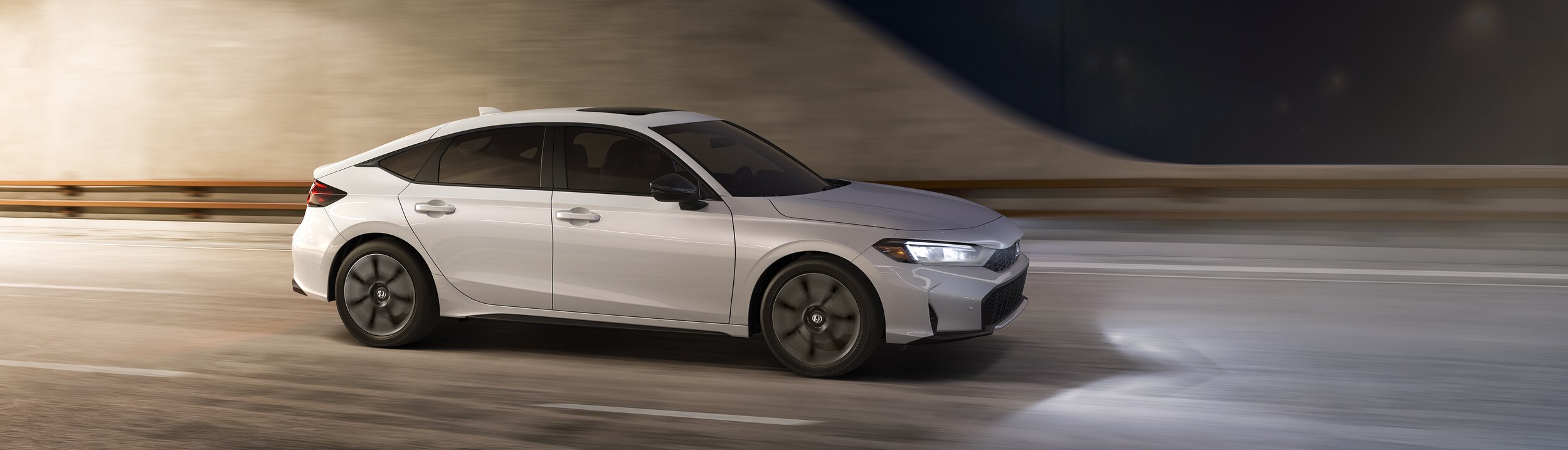 Honda Civic Sport Touring Hybrid White Honda Civic Sport Touring Hybrid driving in a city