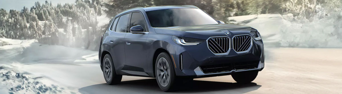2026 BMW X3 Driving on a Snowy Day