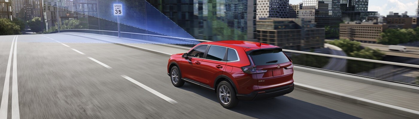 Honda CR-V EX Red CR-V EX driving on the highway