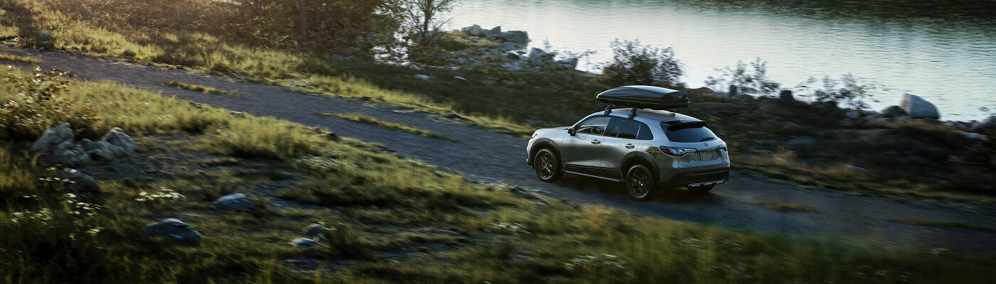 Honda HR-V Grey HR-V driving by a lake