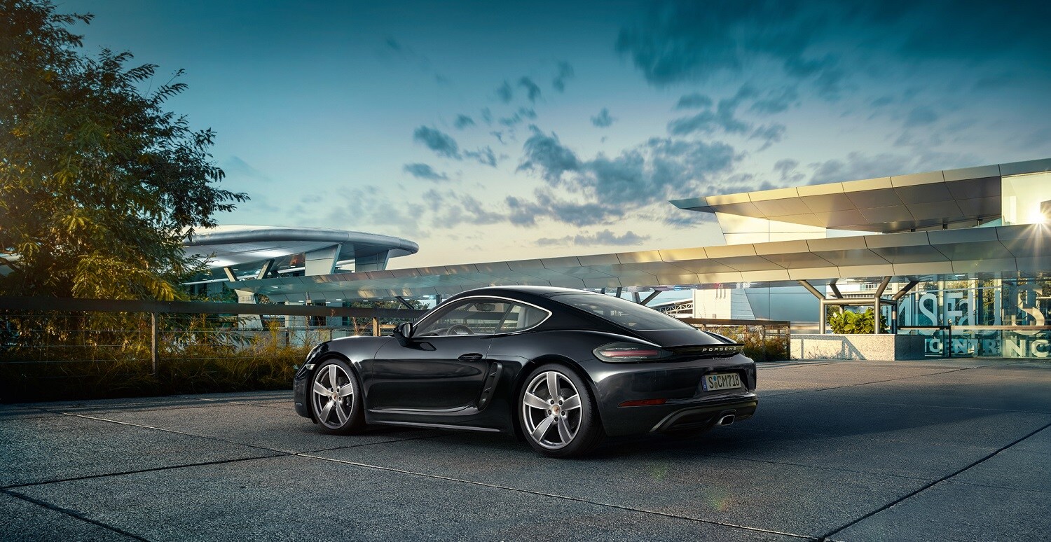 Porsche 718 Cayman Rear exterior of Porsche 718 Cayman in black