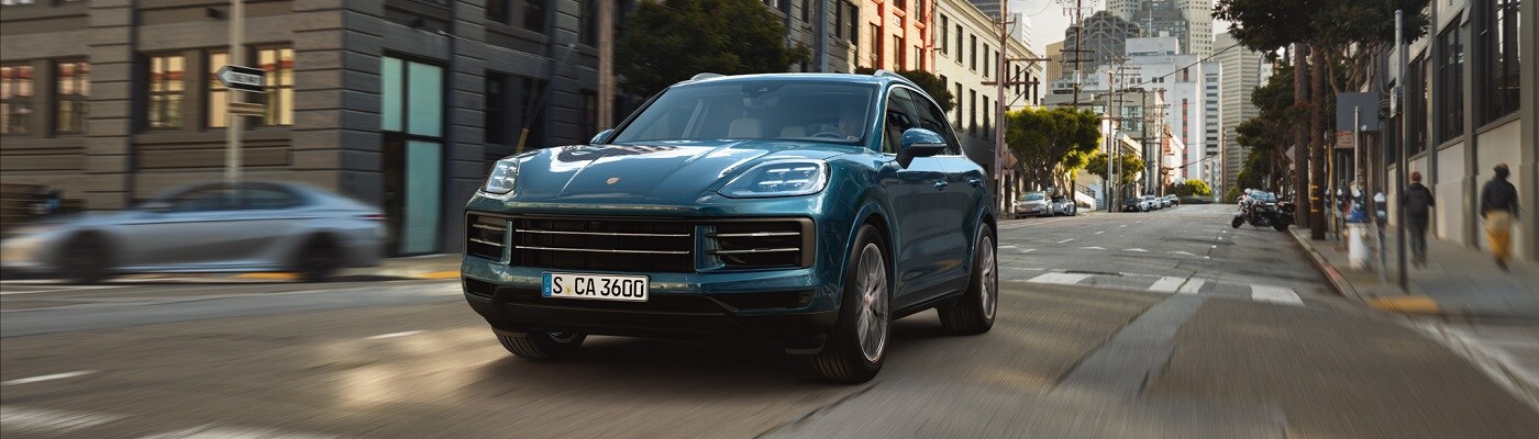 Porsche Cayenne Cayenne driving in the street