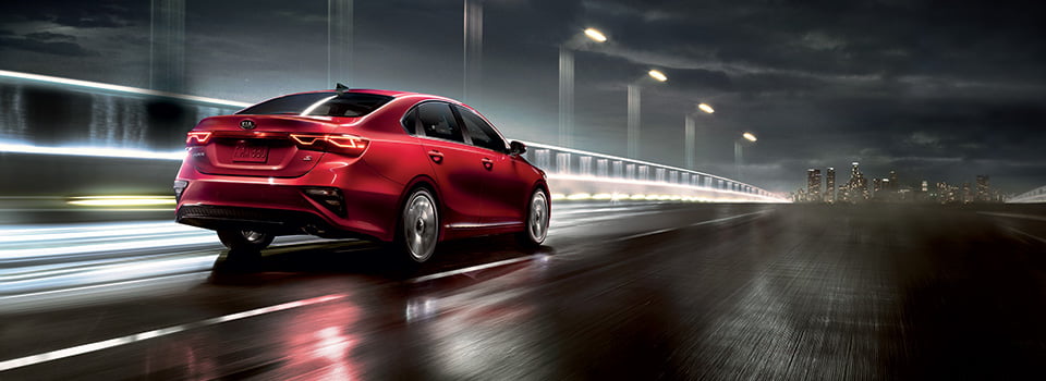 2019 Kia Forte 2019 Kia Forte driving towards a city