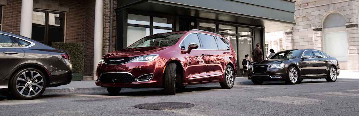 Chrysler Pacifica parked ahead of Chrysler 300