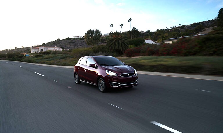 2019 Mitsubishi Mirage driving through leaves 2019 Mitsubishi Mirage
