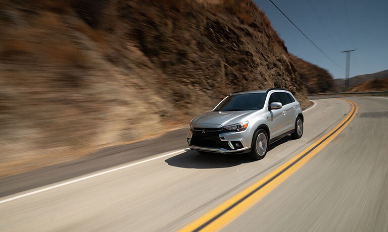 2019 Mitsubishi Outlander Sport 2019 Mitsubishi Outlander Sport driving down street