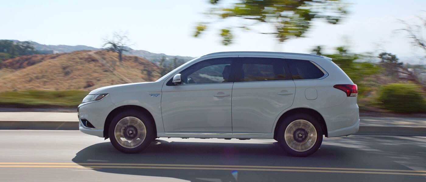 2018 Mitsubishi Outlander PHEV 2018 Mitsubishi Outlander PHEV driving down road