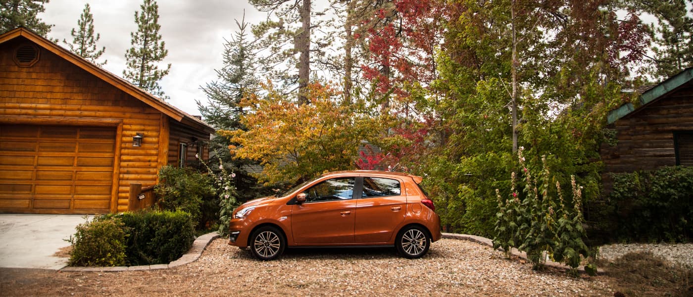 Orange 2019 Mitsubishi Mirage outside during fall