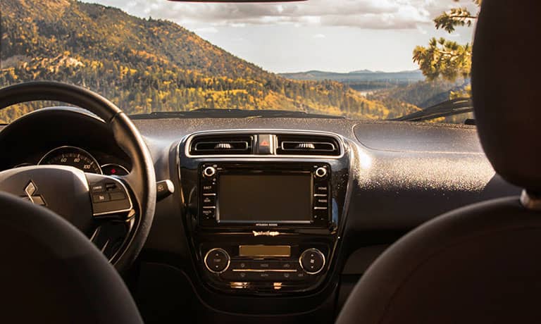 2019 Mitsubishi Mirage driving through leaves 2019 Mitsubishi Mirage