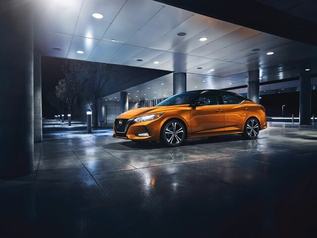 2021-nissan-sentra-orange-night.jpeg 2021 Nissan Sentra parked at night
