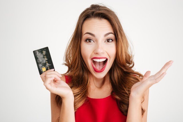 woman-credit-card-speck-hyundai-pasco.jpeg Happy woman using a credit card