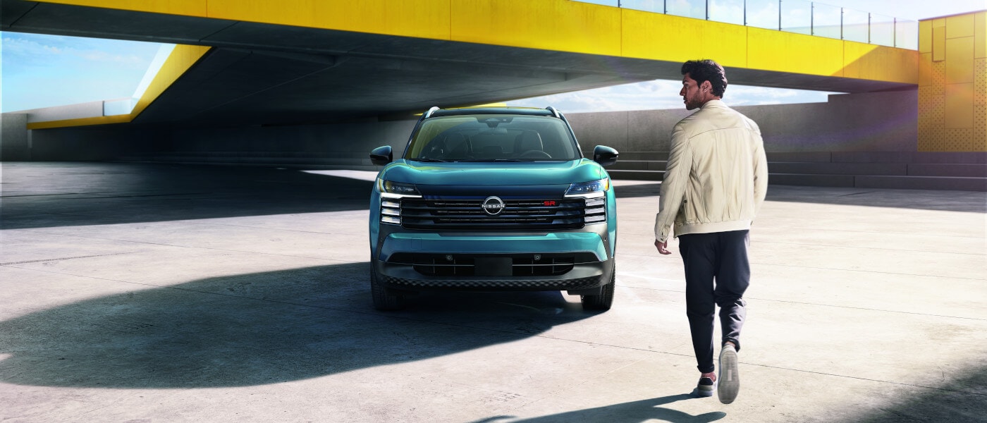 2025 Nissan Kicks Exterior Head On With Approaching Driver