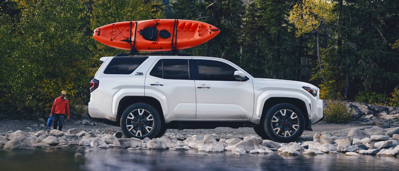 2025 Toyota 4Runner Exterior On Rocky Shore With Kayak