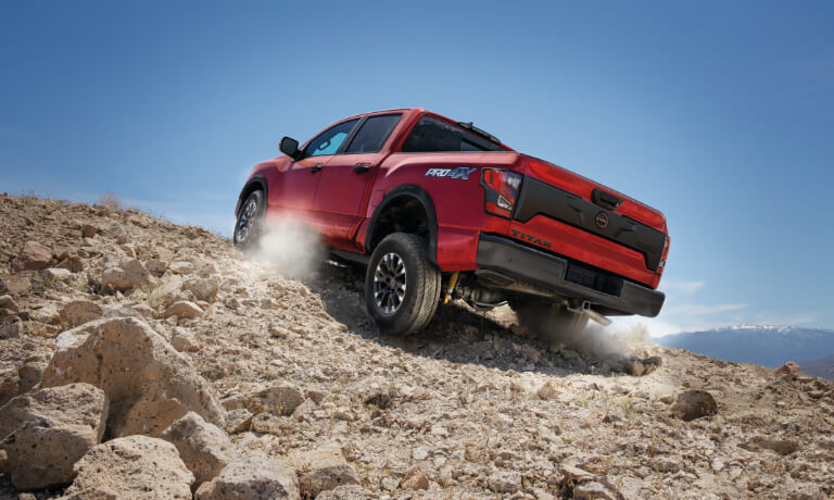 2024 Nissan TITAN Exterior Driving Up Rocky Hill