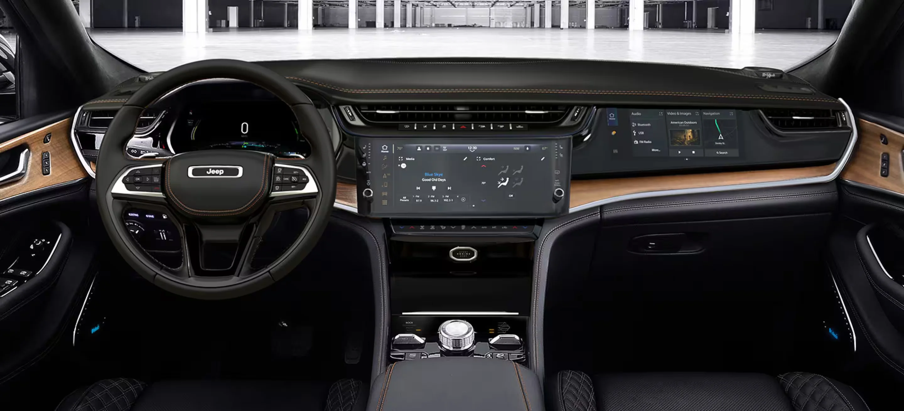 Front seat area of the 2026 Jeep Grand Cherokee Summit interior at Sport Durst CDJR in Durham, NC