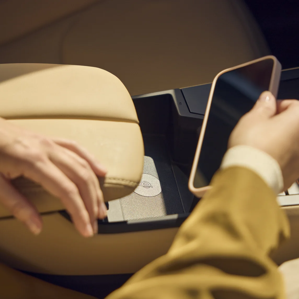 Phone on the wireless charging pad in a Mazda CX-5 console, remote start through the MyMazda app