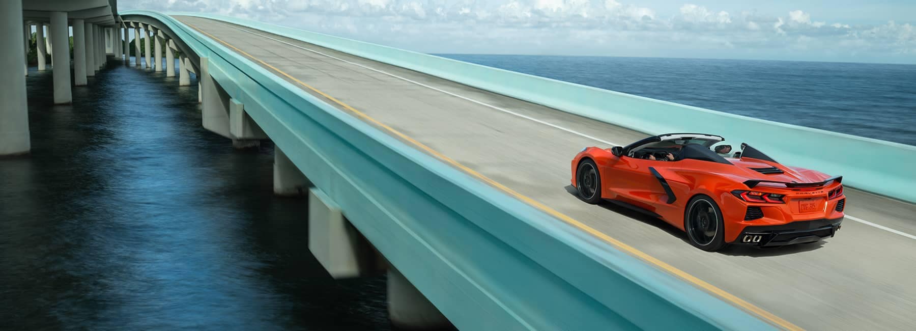 Red-2020-Chevrolet-Corvette-Stingray-Convertible-Driving-on-an-Ocean-Highway.jpg