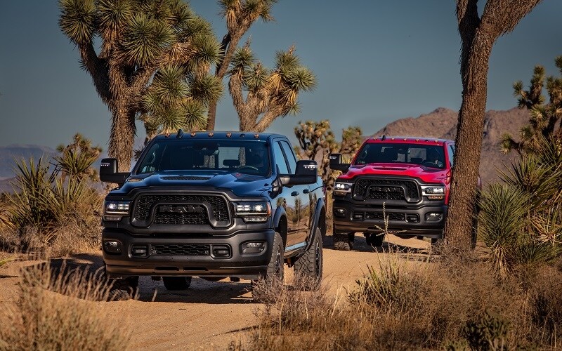 Ram Trucks driving through desert trail