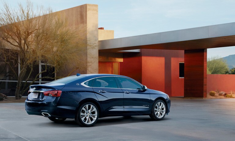 A black 2018 Chevy Impala parked outside