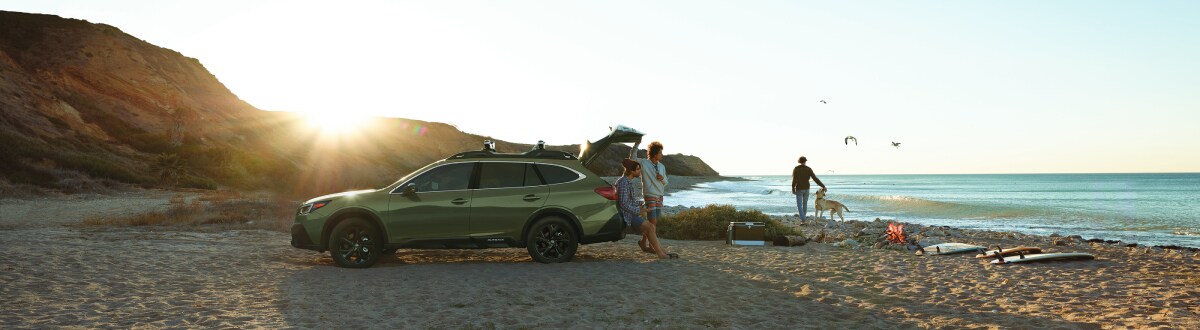 2020-Subaru-Outback-OnyxXT-SUV-L09 (1).jpg New Subaru Outback on the beach with people
