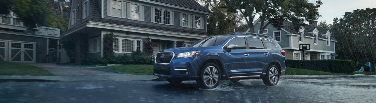 2019-Subaru-Ascent-Touring-SUV-L02 (1).jpg New Subaru Ascent driving on a residential street