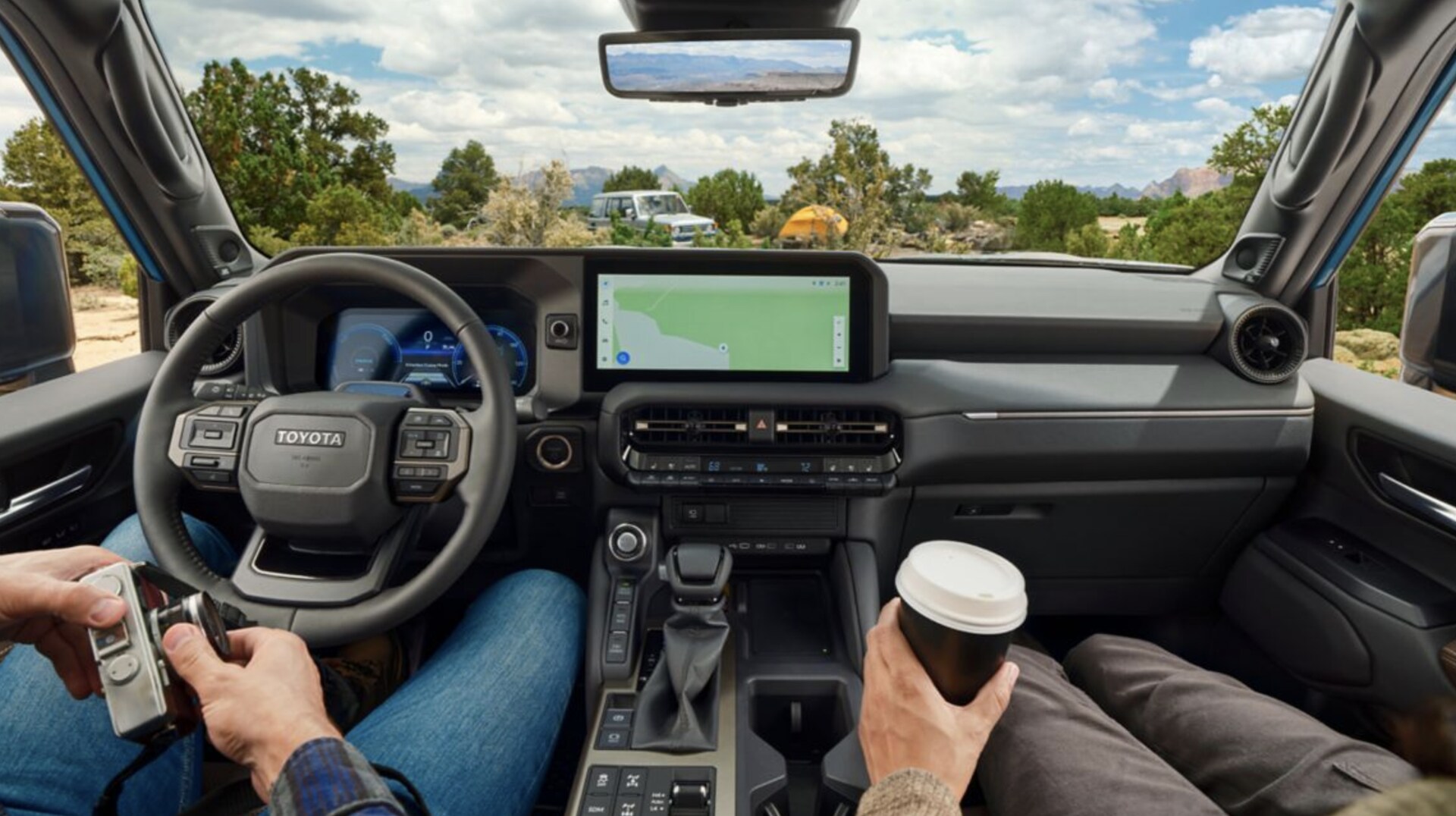 All-New%202024%20Toyota%20Land%20Cruiser%20Tech.png Interior of new 2025 Toyota Land Cruiser for sale near Ennis, TX