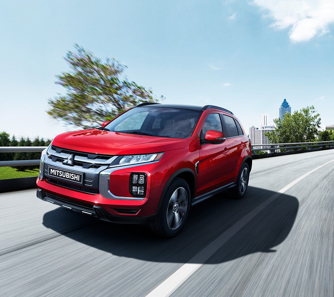 2021 RVR In Red Driving On Highway.jpg