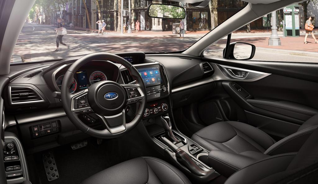 vue de l'habitacle et du tableau de bord d'une Subaru Impreza 2023
