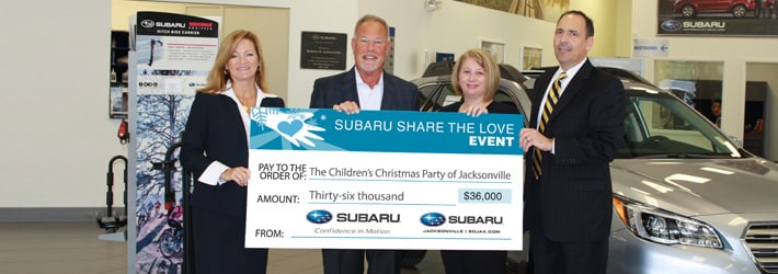 Check presentation to Children's Christmas Parts of Jacksonville