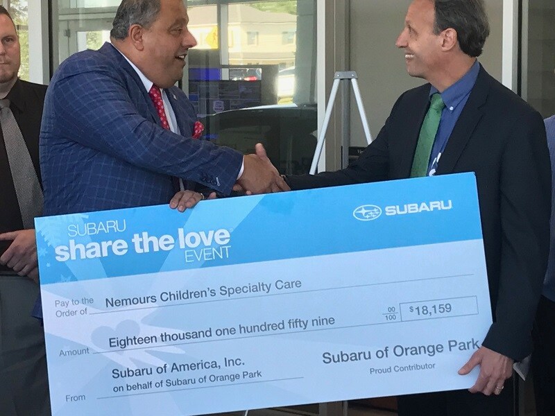 Subaru of Orange Park gives donation to Nemours Children's Specialty Care