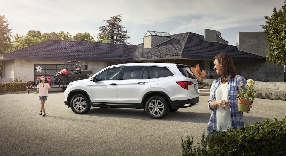 Certified Pre-Owned Honda Pilot Honda Pilot in driveway