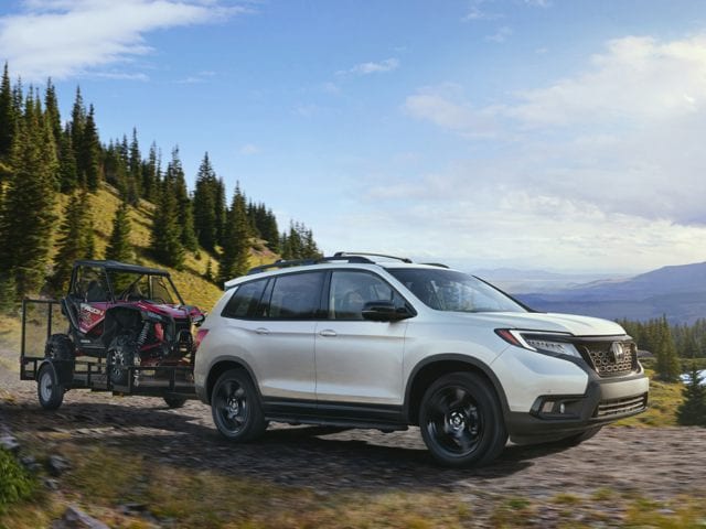 2019 Honda Passport 2019 Honda Passport driving through woods
