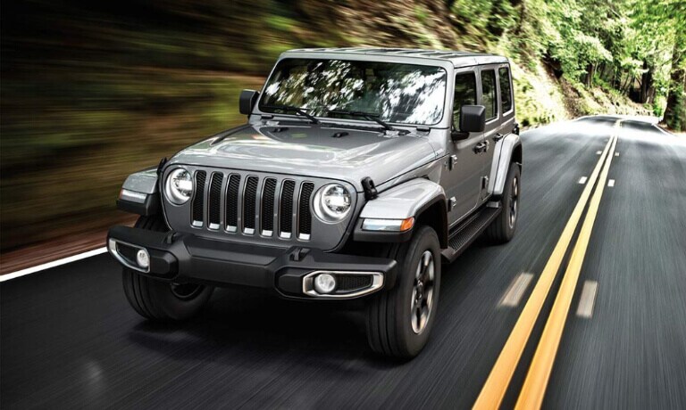 2019 Jeep Wrnalger driving through woods