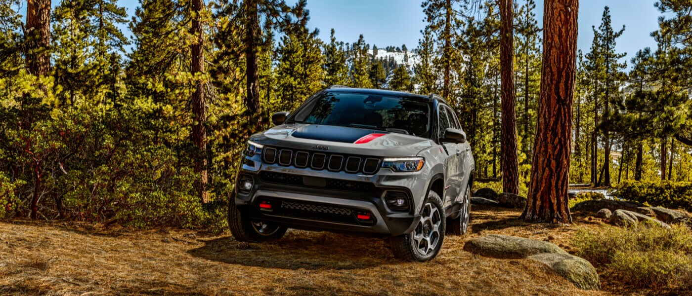 2024 Jeep Compass offroading in a forest