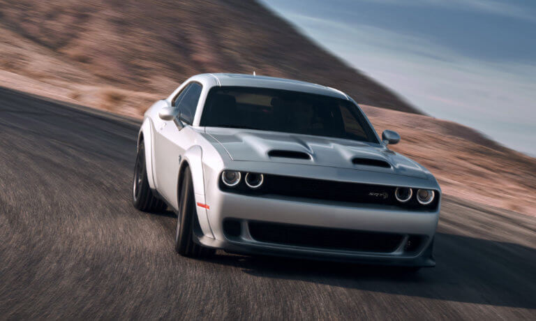 2023 Dodge Challenger driving through a desert