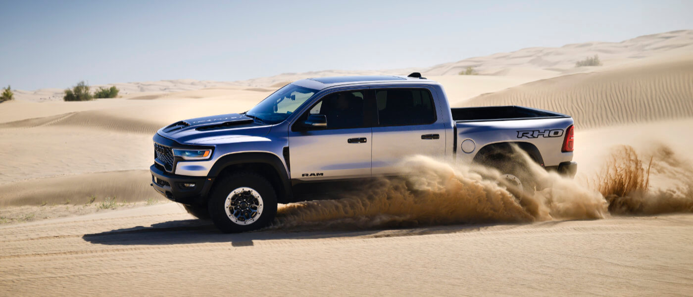 2025 Ram 1500 RHO offroading with a profile view