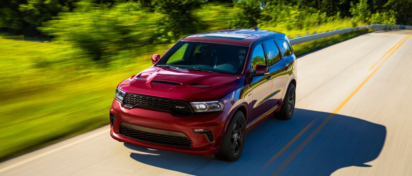 2025 Dodge Durango driving on grassy highway