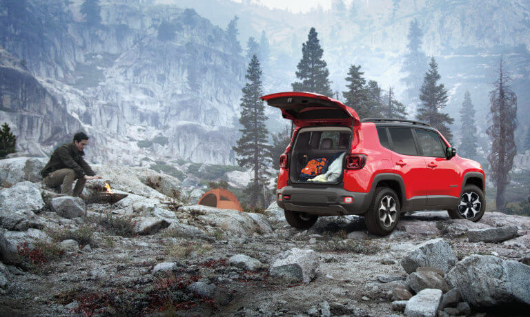 2023 Jeep Renegade parked on a rocky campsite