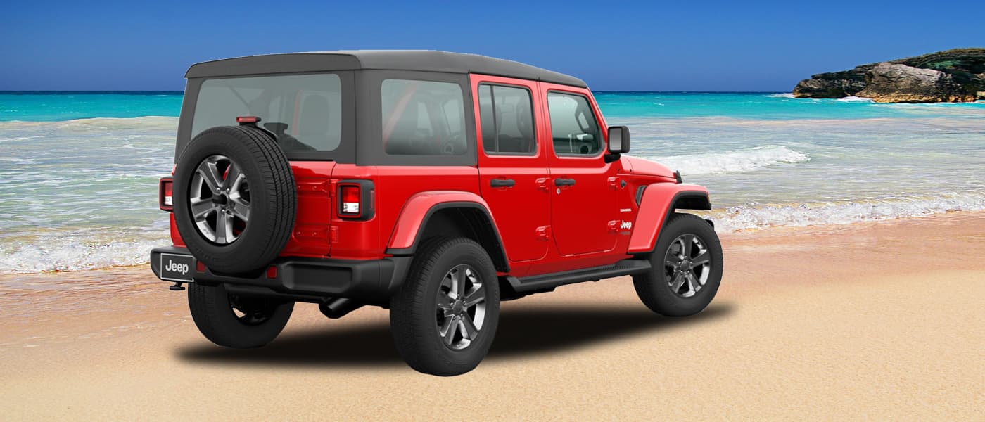 2020 Jeep Wrangler parked on a beach