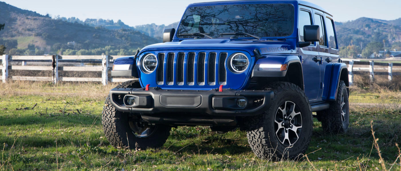 New Jeep Wrangler Rubicon parked at a farm
