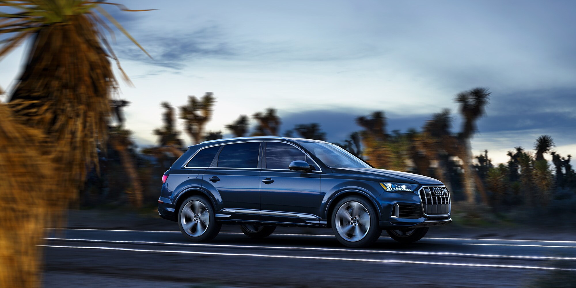 MY20-Q7-55-TFSI-Prestige-Laser-headlights-package-Luxury-package-Towing-package-22-Audi-Sport-5-arm-edge-design-matte-platinum-wheels-Navarra-Blue.jpg