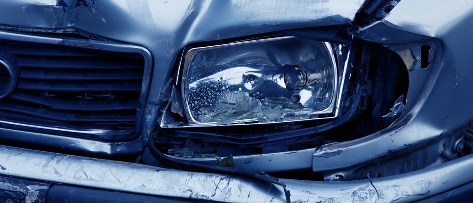 Body Repair.jpg Damaged front end of car before auto body repair