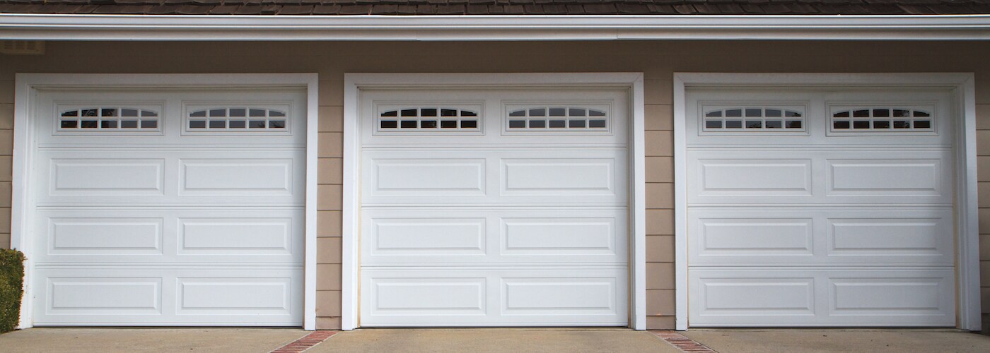 three shut garage doors