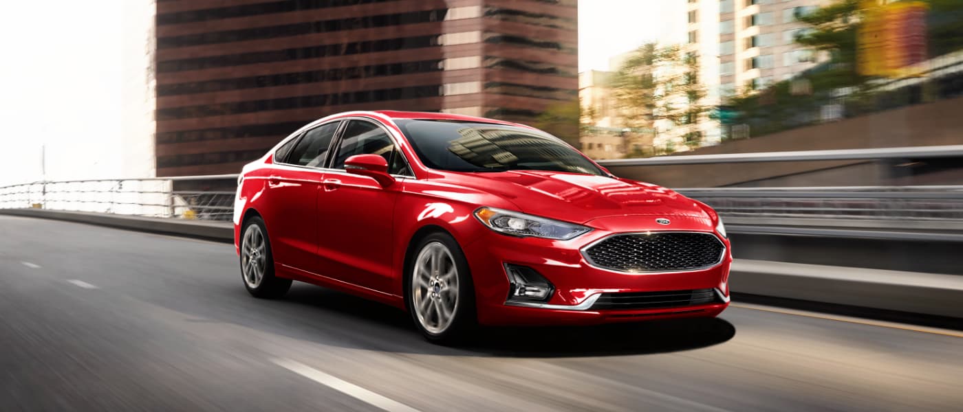2020 Ford Fusion driving in the city