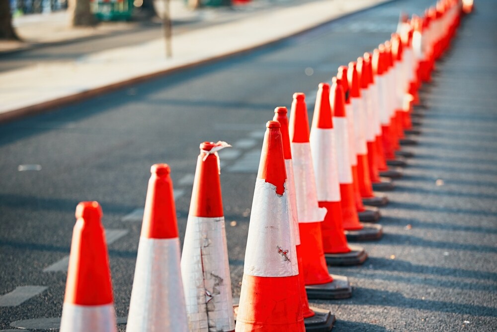 Safety Features to Look for When Buying a Used Vehicle Orange construction cones lined up on the road